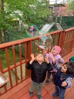 The children learn the joy of working and playing together. Through shared experiences, they develop a strong sense of community—where cooperation, not competition, is at the heart of everything we do. We value strong partnerships with parents and believe that working together helps each child grow and succeed. By building mutual understanding and trust, we create a team that supports every step of your child’s early learning journey.